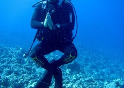 Steve Blum meditating underwater while scuba diving