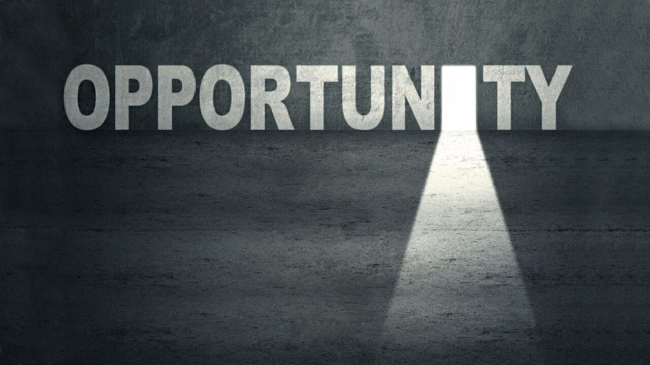 The word "Opportunity" with a lit doorway instead of the "I"