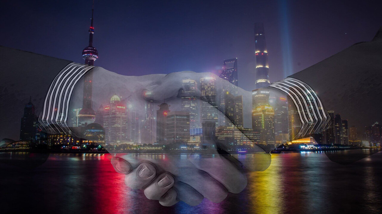 Respect- Handshake with Evening City Background