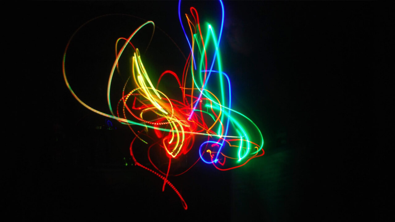The Influence of You: Color Poi over black background