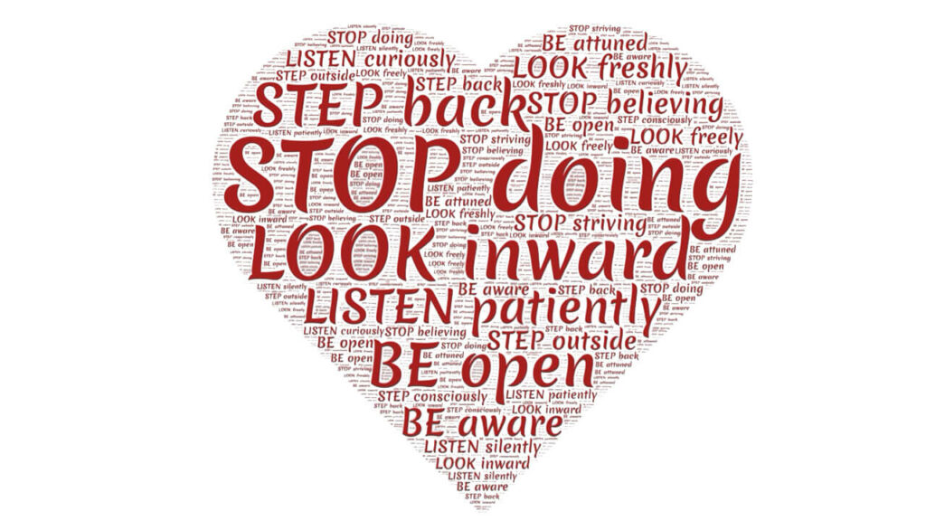 Red heart graphic made up of encouraging words over a white background